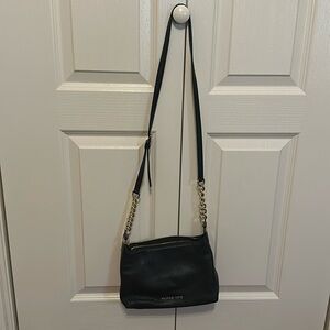 Micheal kors crossbody black bag.
